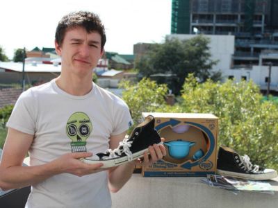 Ray Pastoors with ETIKO fair trade Vegan sneakers and Green Toys